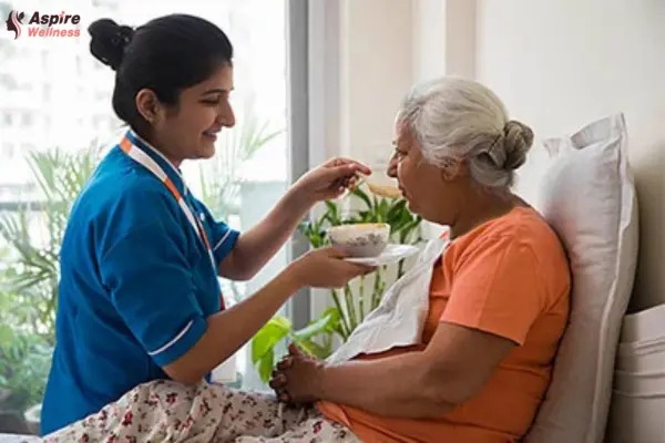 Qualified home nursing team of Aspire Wellness DHA Karachi providing elderly care services